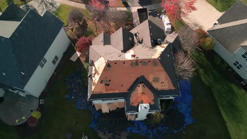 Roof Construction on House in Suburban Neighborhood