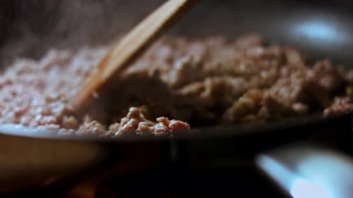 Ground Meat Cooking in Silver Pan on Stove