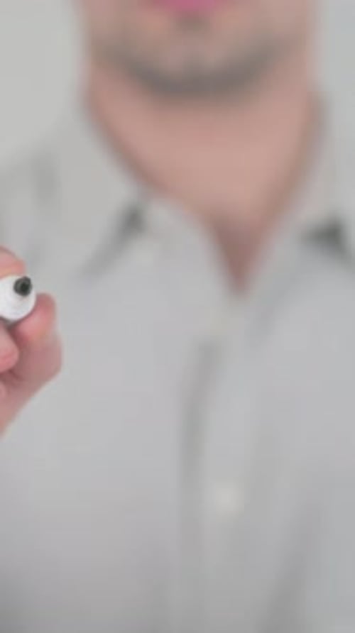 Man Writing Domain Word on Glass Surface