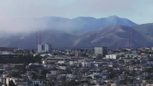 Aerial View of the Golden Gate Bridge Surrounded By Fog in San Francisco California USA