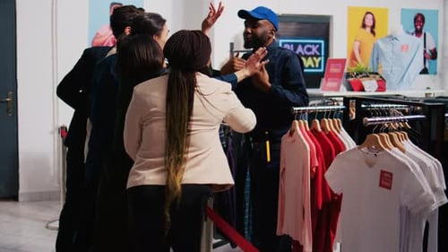 Group Confronting a Security Guard in Retail Store