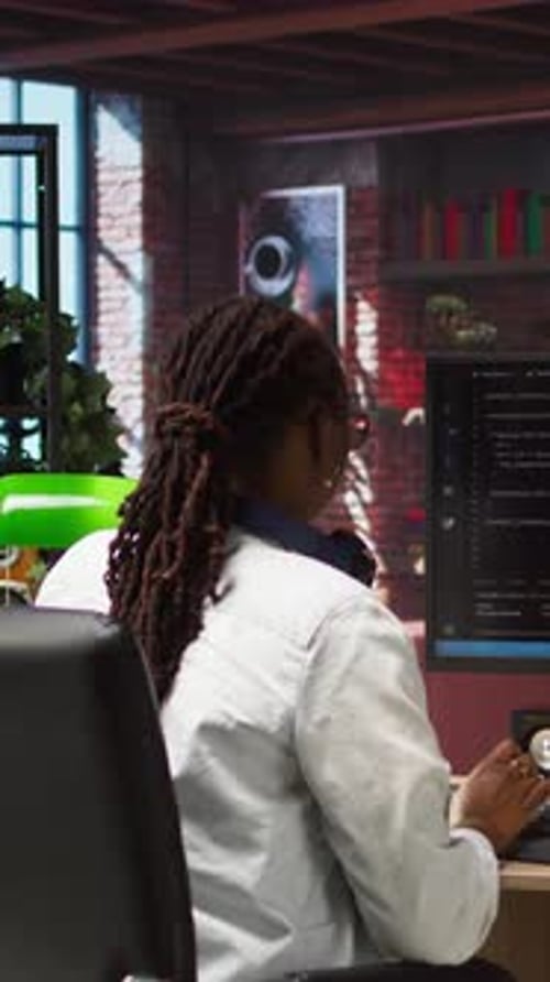 Vertical Video Woman Works with AI Deep Neural Networks on PC at Home