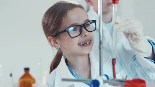 Children Doing Science Experiment in Chemistry Lab
