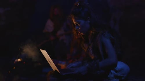 Cavemen Uncovering and Exploring Technology Within a Primitive and Ancient Setting