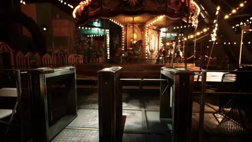 Empty Amusement Park at Night with Illuminated Rides and Deserted Entrance