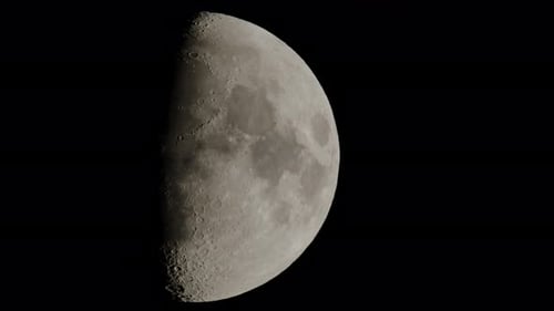 Detailed Close-Up of Waxing Gibbous Moon in Space