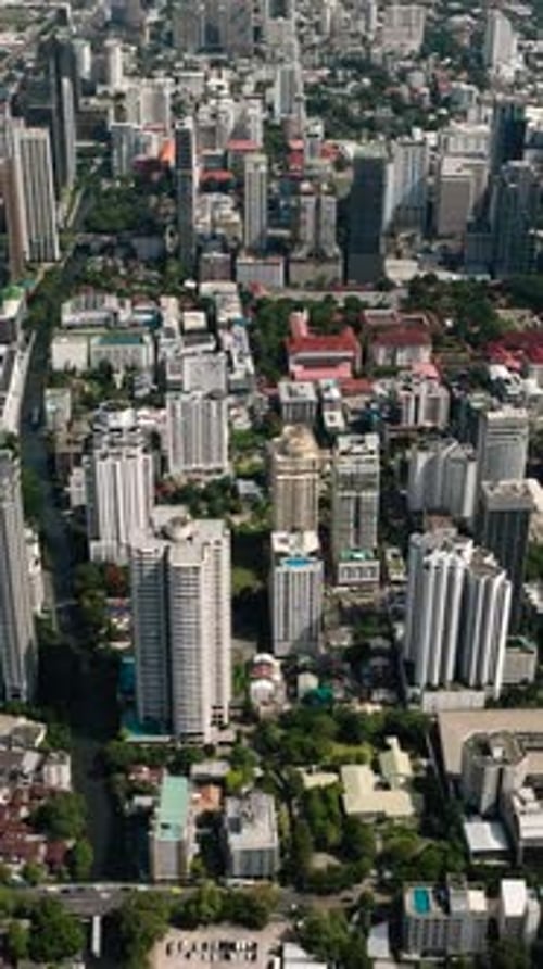 Top View of High Rise Buildings and Green Spaces Bangkok Thailand