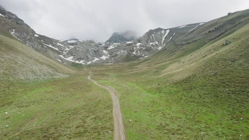 Picturesque Valley, Dramatic Mountain Range, People Hiking