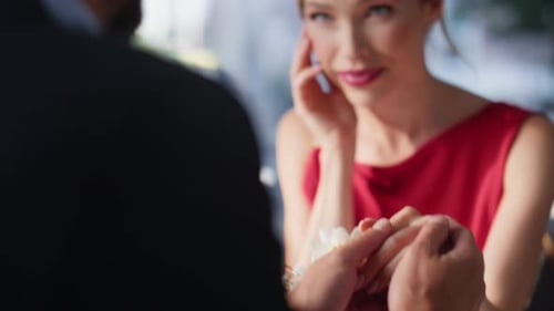 Closeup Pair Holding Hands at Restaurant Happy Romantic Couple Celebrating