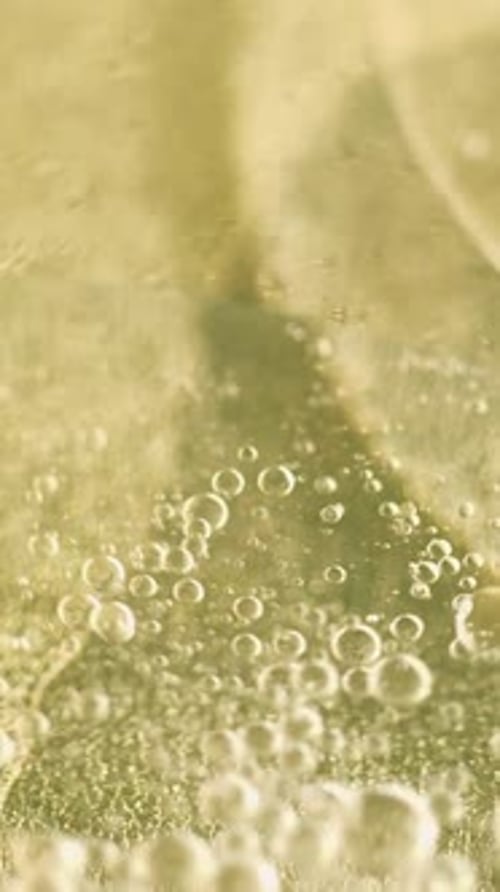 Vertikaler Ölblasenwirbel, flüssige Gasstruktur, goldfarben