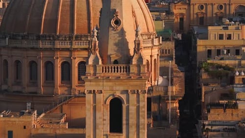 Aerial Close Up of Baroque Church Dome and Towers in Valletta