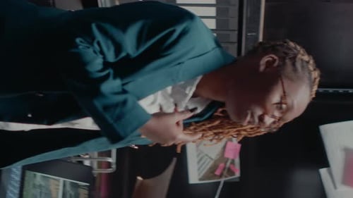 Focused Adult Investigator Analyzing Crime Scene Evidence