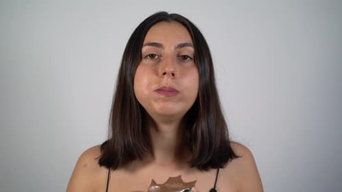 Woman Enjoys Eating Rich Chocolate