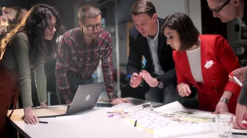 Team Collaborating on Design in Modern Office