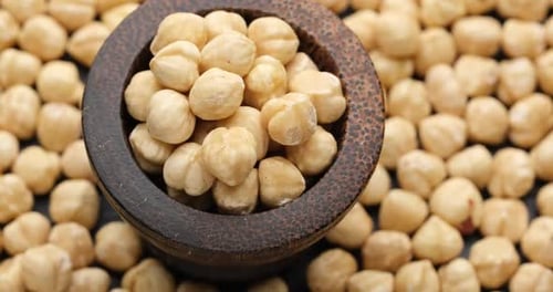 Whole Shelled Hazelnuts Nuts Kernels Closeup on Sliding Platform