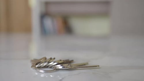 House Keys on the Ring on Table in a Room To Forget Keys at Home Concept