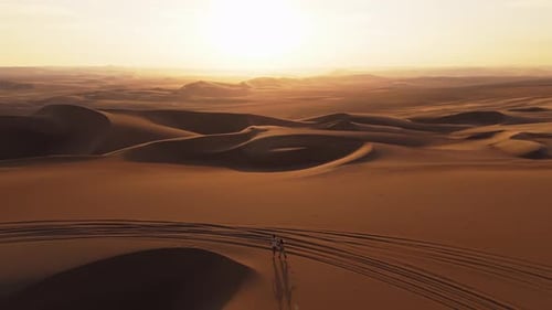 Aerial View of Sand Dunes in Peru at Sunset More