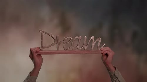 Hands Holding Up a Dream Sign