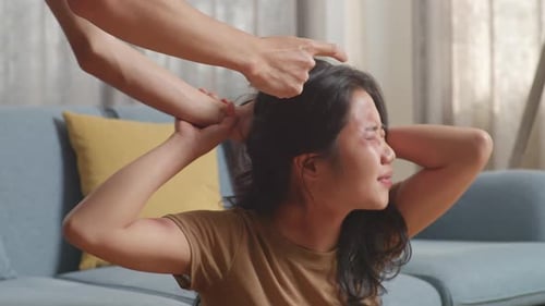 Young Asian Woman Victim Of Violence With Bruise On Body Abused By Man's Hands Pulling Her Hair