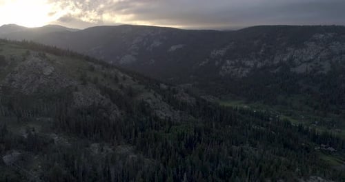 Aerial Over Rocky Mountain Landscapes in Colorado During Sunset, Aerial Of Sunset Over Mountains in