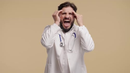 Frustrated Doctor Yelling and Massaging Temples in Distress