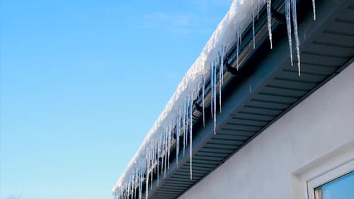 Icicles Hang on the Roof