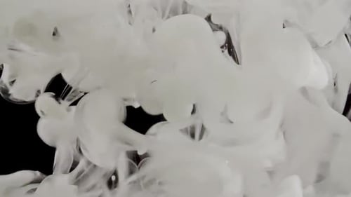 Swirling Opaque White Clouds on Black Background