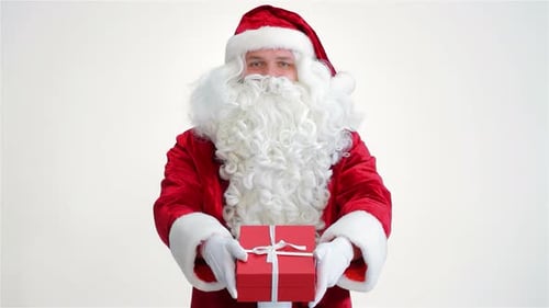 Santa Claus Presents a Holiday Gift