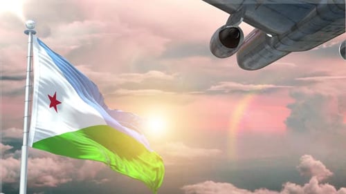 National Flag Waving with Airplane Flying Against Sunrise Sky