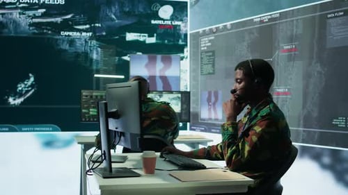Army Professional in Uniform Works in a Mission Control Center