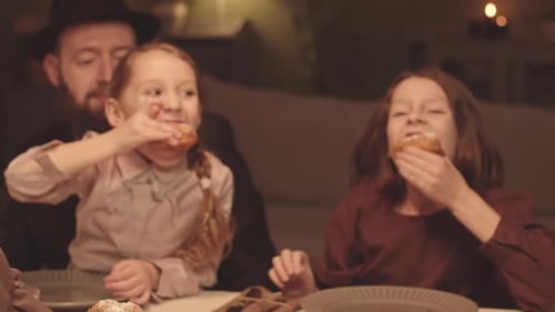 Family Enjoys Freshly Made Donuts at Home