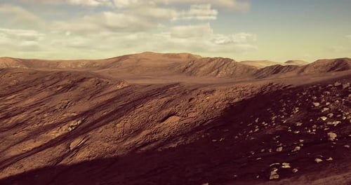 Flying Over Arid Rocky Mountain Desert Landscape