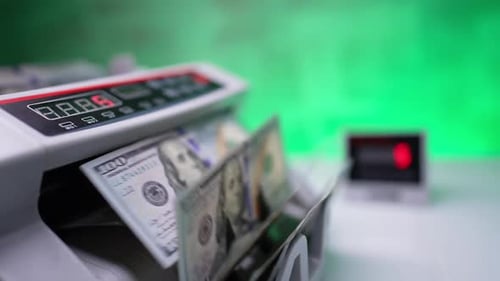 Money Counting Machine Processes US Dollar Currency