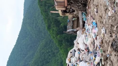 Bulldozer at an Illegal Landfill in a Rural Area