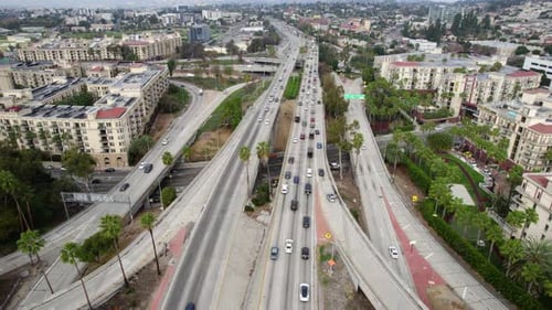 Los Angeles USA, Aerial View of Traffic on US-101 Highway, Hollywood Freeway and Interchange by Down