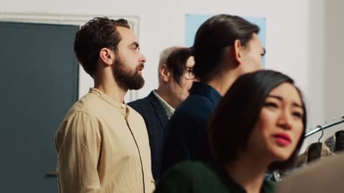 Adults Standing Together in Clothing Studio