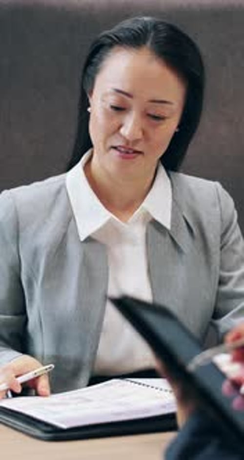 Woman, documents or meeting with review for corporate finance, assessment or project budget