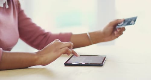 Hands, tablet or woman with credit card in office on ecommerce or digital fintech website