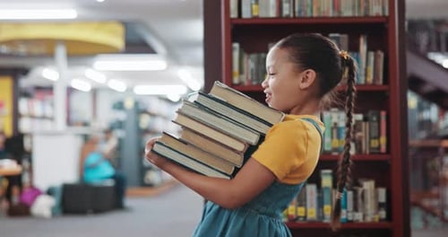 Happy, library and child carry books for learning, education and language development