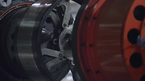 Detailed Automobile Tyre Plant Mechanism Moving in Automotive Workhouse Closeup. Close Up
