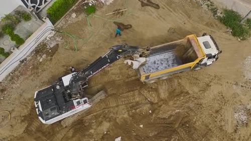 Aerial View Early Construction Concrete and Heavy Machinery