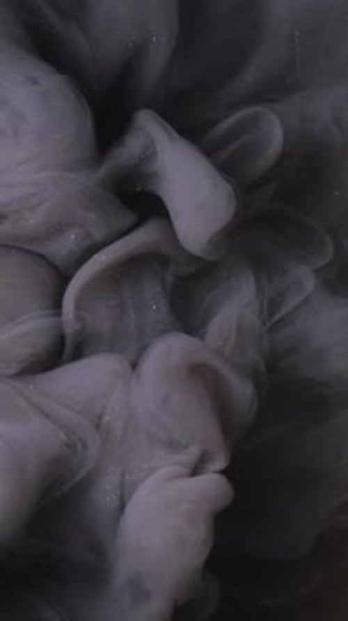 Abstract White Smoke Plumes Flowing in Liquid