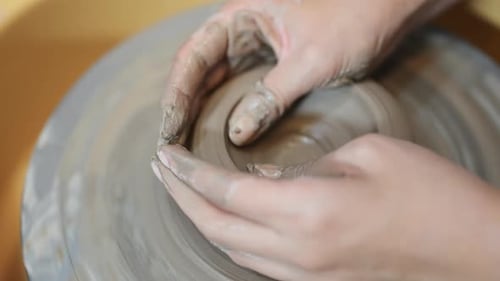 Professional Craftsman Potter Making Jug on Potter Wheel Circle