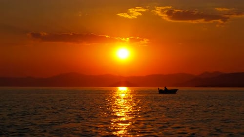 Alone Fishing Boat Sailing on Dark River