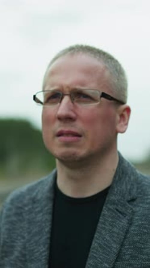 Adult Man in Glasses and Blazer
