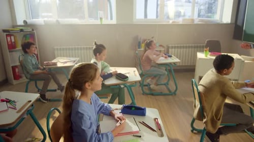 Focused Children Learning Science in School Class. Crane of Mixed Race