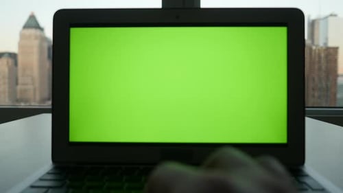 Computer Screen Isolated on GreenScreen Background Chroma Key in City Office