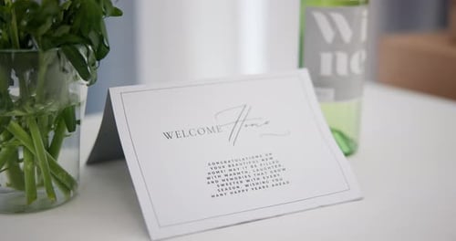 New home, real estate and note on table for moving to dream house, property purchase and apartment