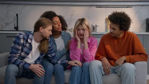 Multiracial Men Women Sitting on Couch at Home Support Friends Sad Crying African American Caucasian
