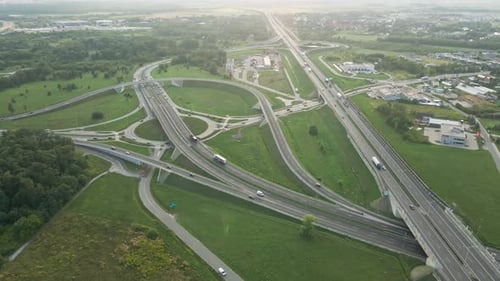 Cars Moving on Transport Road Junction in City Aerial View